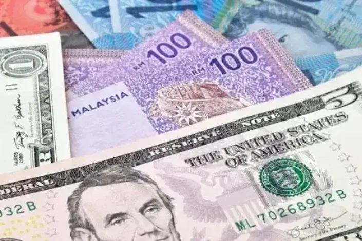 令吉兑美元升破4.0